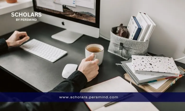 Student workspace with laptop and study materials while preparing an application for the Brunei Darussalam Government Scholarship.